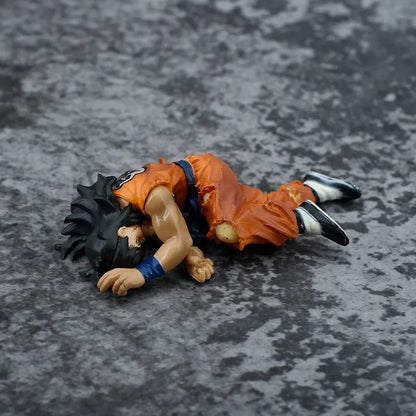 Figura de Yamcha Derrotado en el Suelo