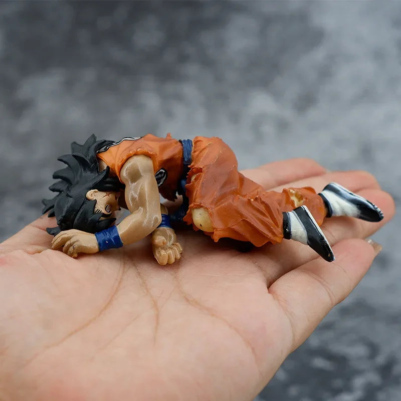 Figura de Yamcha Derrotado en el Suelo